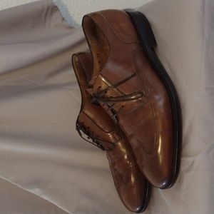 Salvatore Ferragamo Italian made by leather dress shoes. Size 9